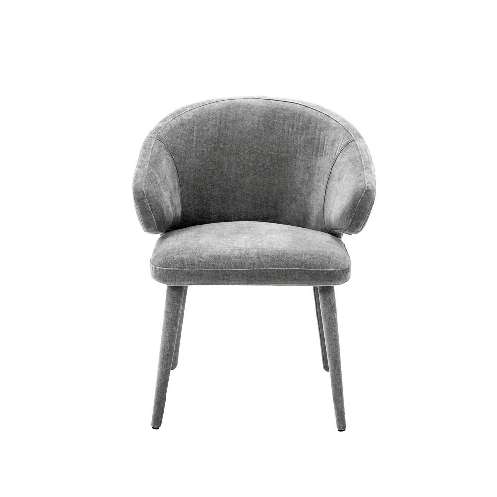 A sophisticated grey upholstered dining chair with tapered legs 