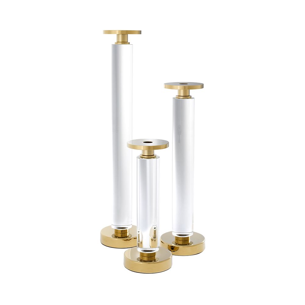 A luxury set of candle holders crafted from crystal glass with a gold finish