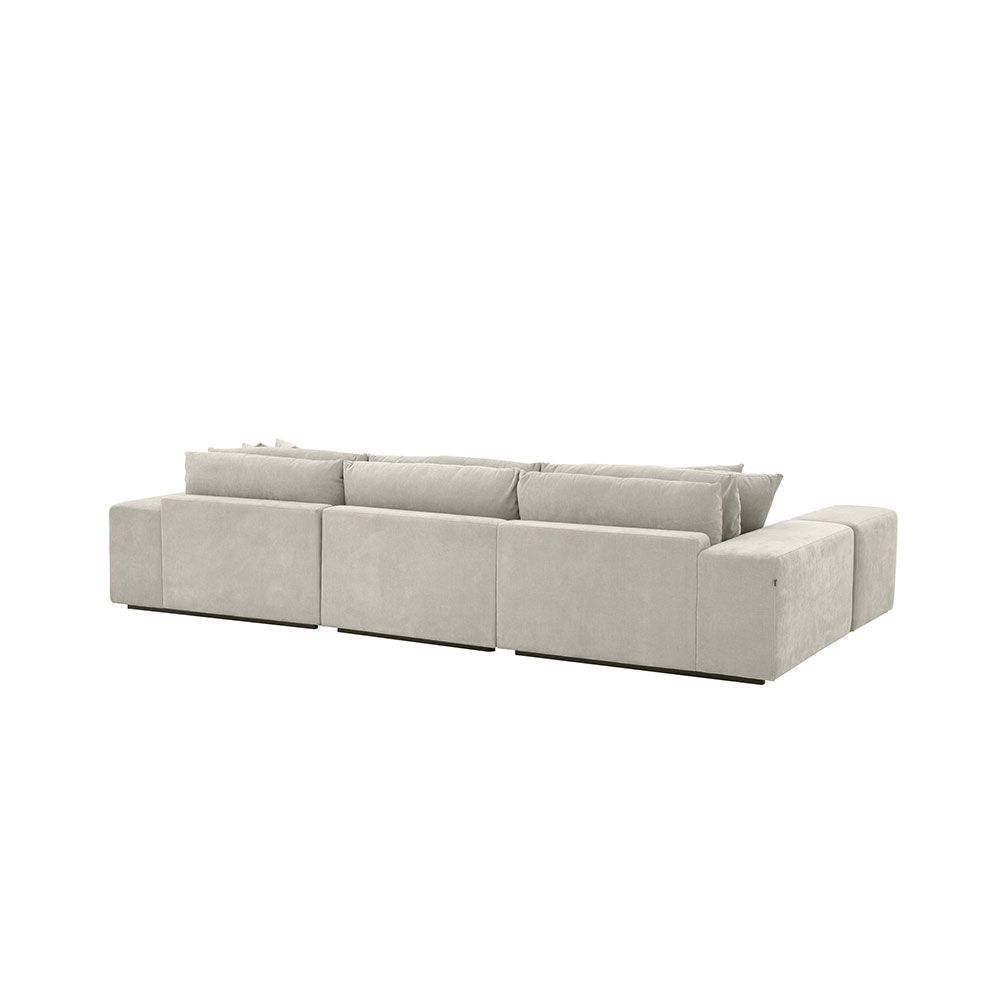 Luxurious and plush corner sofa in clarck sand upholstery 