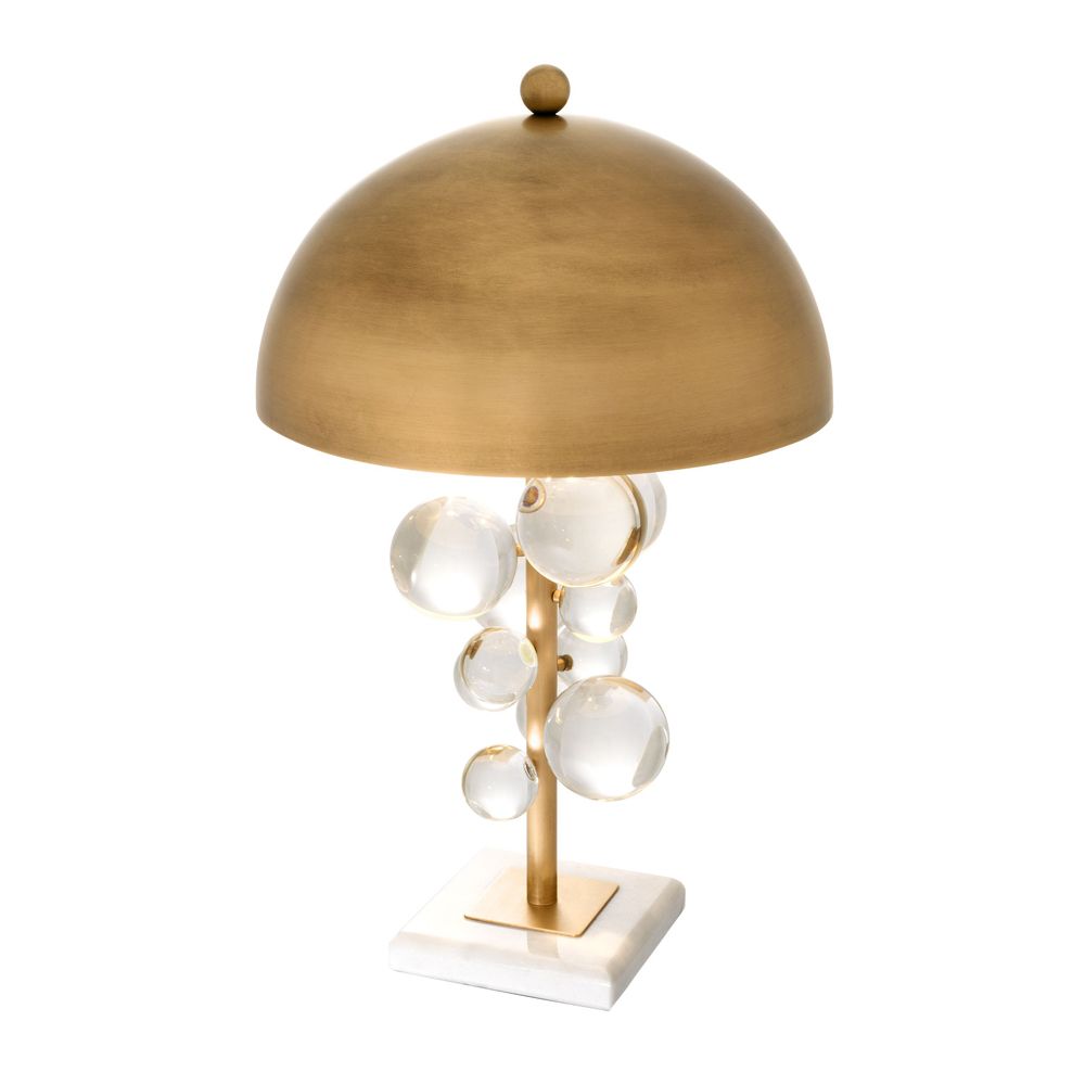 Eichholtz modern retro golden table lamp with clear glass and marble