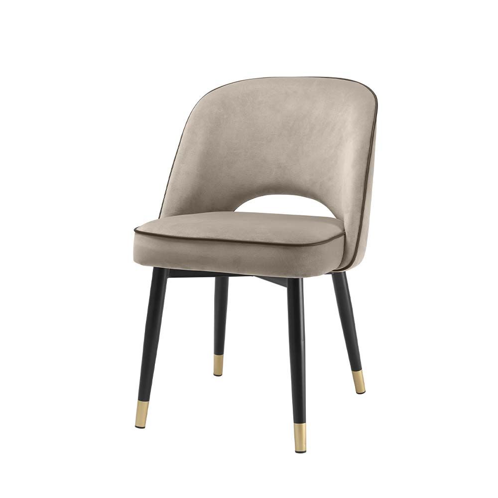 Classic and chic set of 2 dining chairs from Eichholtz upholstered in a greige velvet fabric