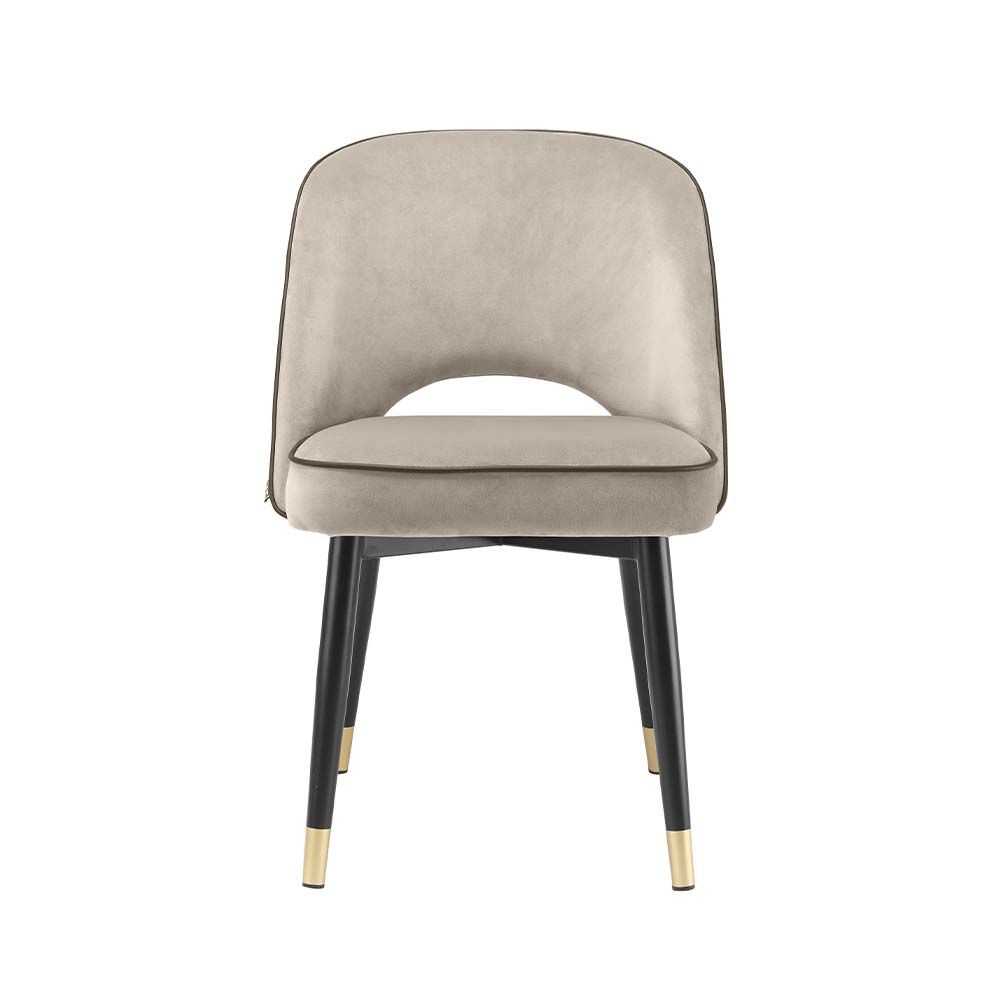 Classic and chic set of 2 dining chairs from Eichholtz upholstered in a greige velvet fabric