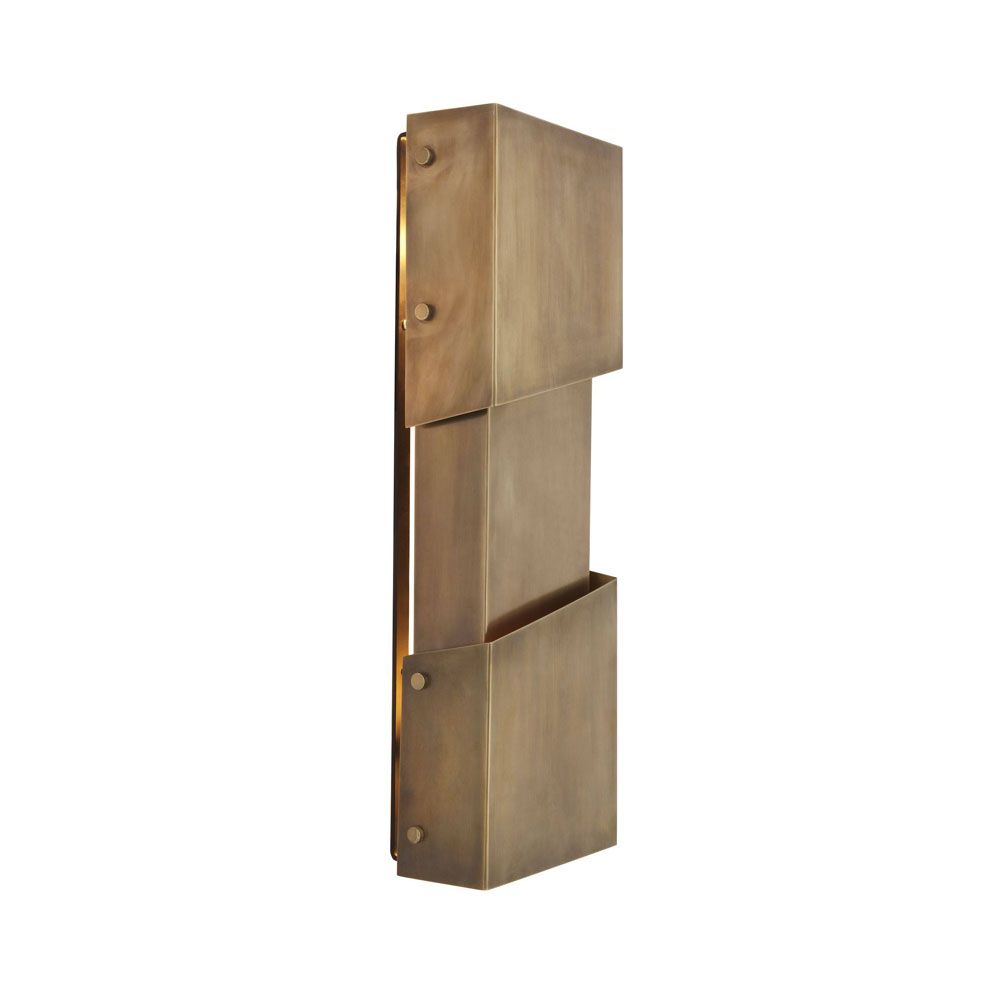 A luxurious antique brass wall lamp inspired by industrial design