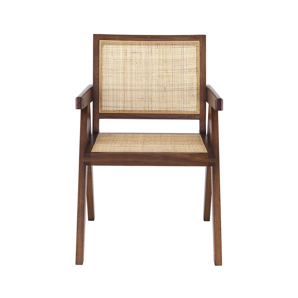An iconic, brown Jeanneret-inspired dining chair with a rattan seat and backrest