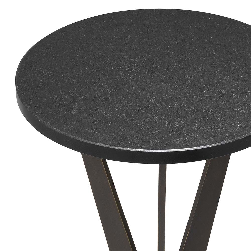 A dark-featured, granite and bronze side table