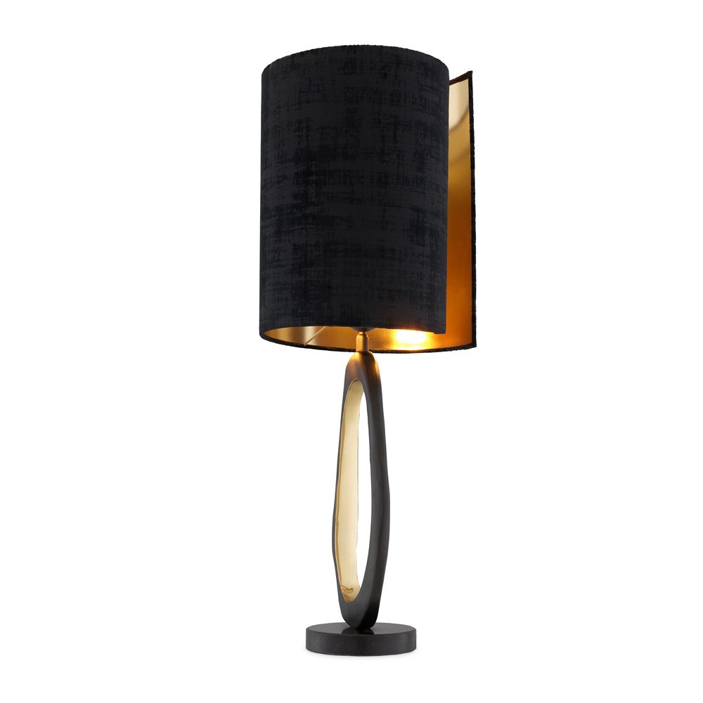A modern luxury table lamp with black and brass accents by Eichholtz