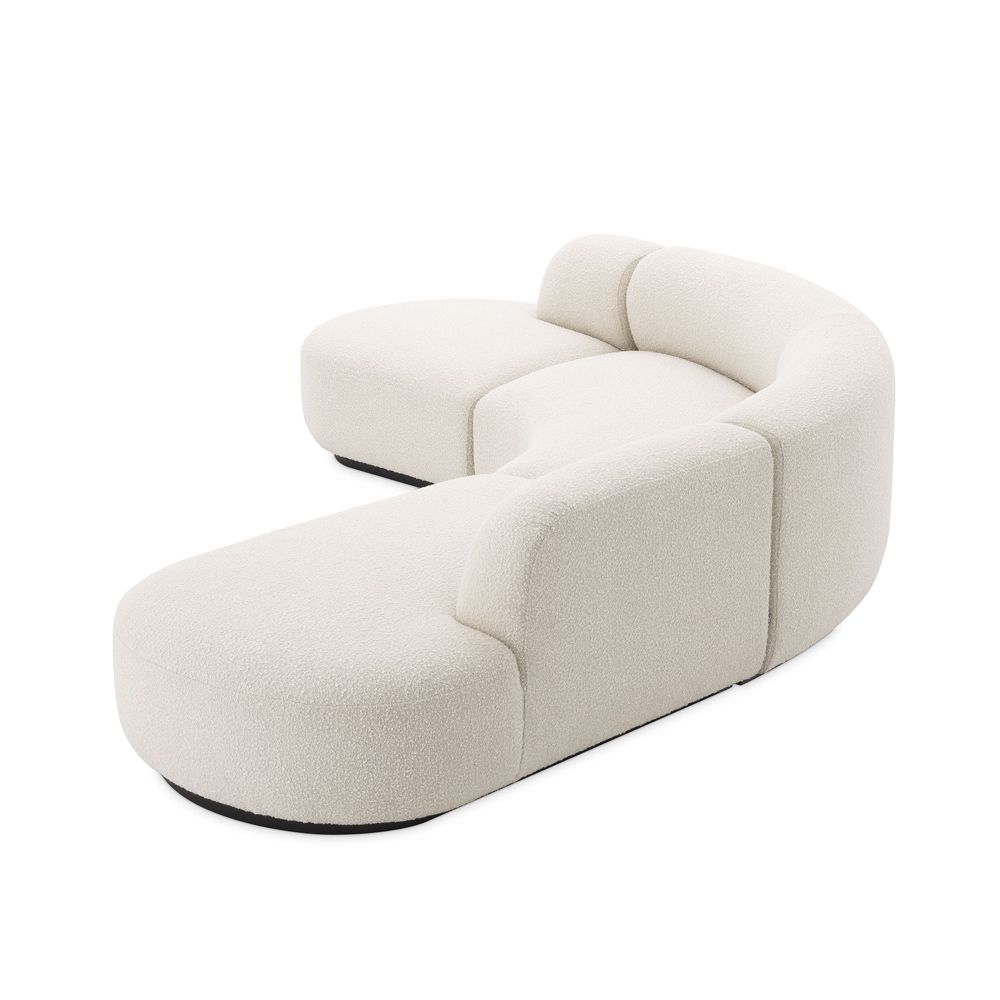 An exquisite, contemporary curved sofa with boucle upholstery