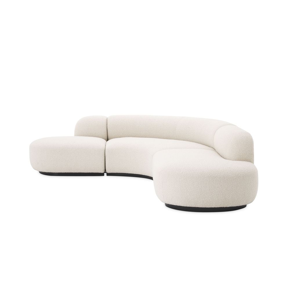 An exquisite, contemporary curved sofa with boucle upholstery
