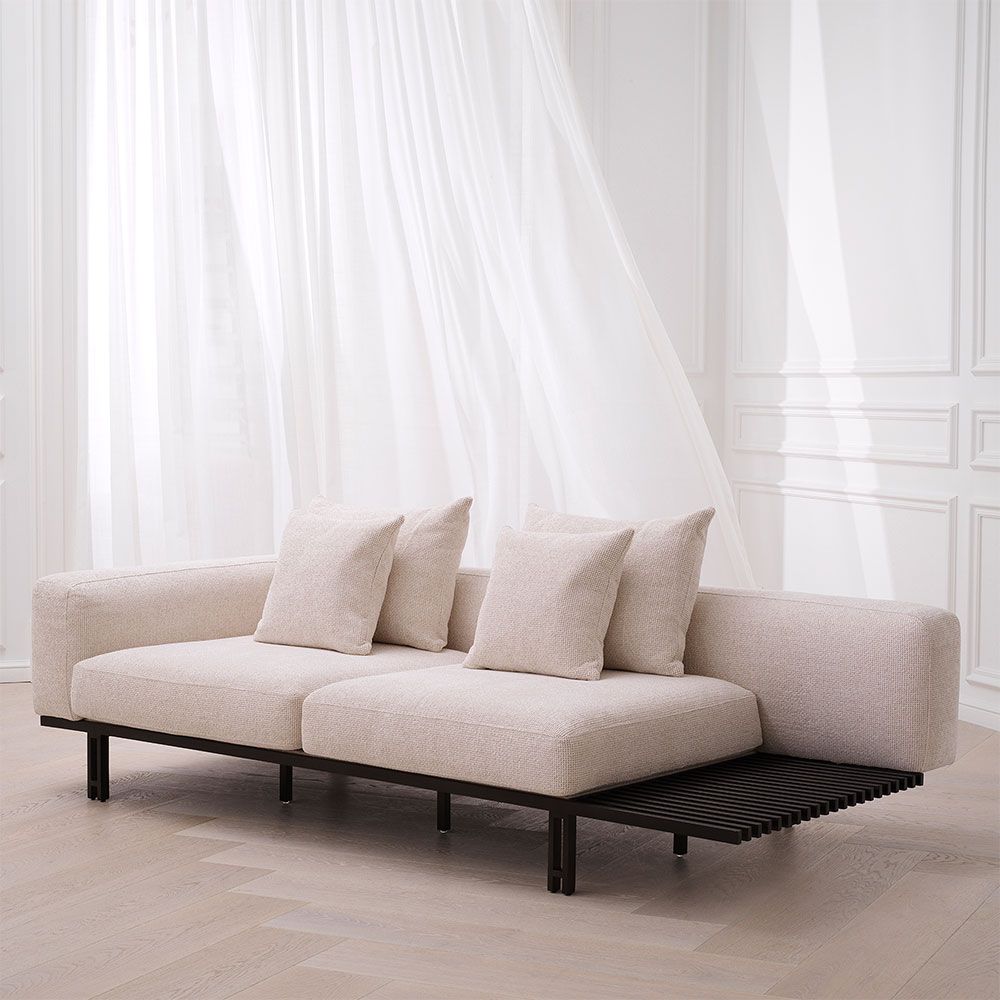 Sofa with outlet integrated table