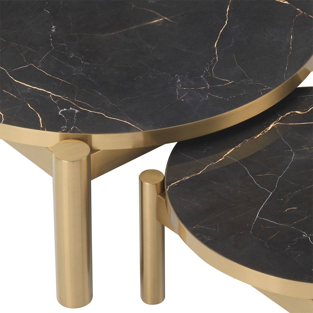 A luxurious set of 2 marble and brushed brass coffee tables