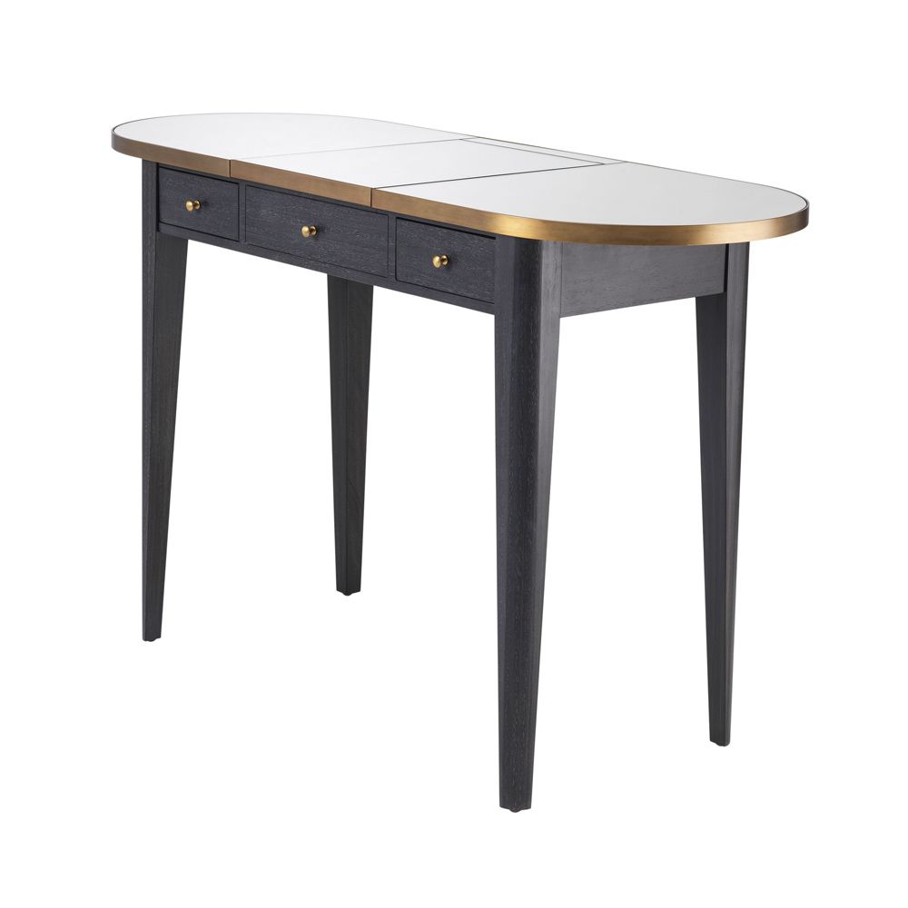 A luxurious, grey charcoal dressing table with brass details and a mirrored surface