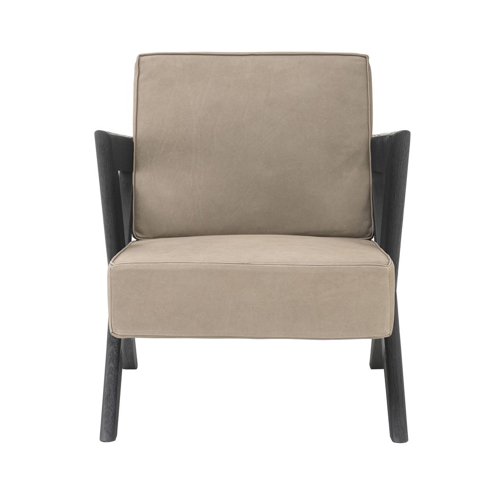 A chic, tan-toned leather armchair with contrasting dark brown x-shaped legs