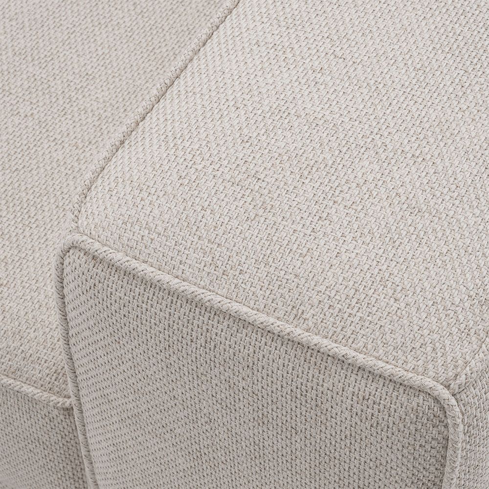 A gorgeous sofa by Eichholtz with a Pausa Natural upholstery, piping and curved black legs