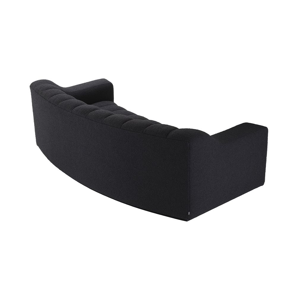A stunning contemporary black boucle sofa