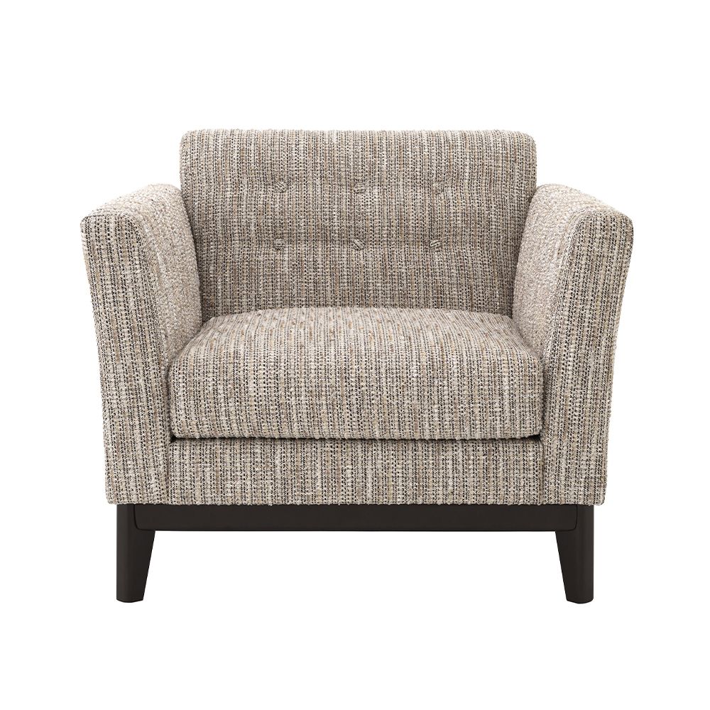 A modern Mid-Century inspired armchair by Eichholtz with a chic beige upholstery, a matte black frame, classic tufting and curved armrests