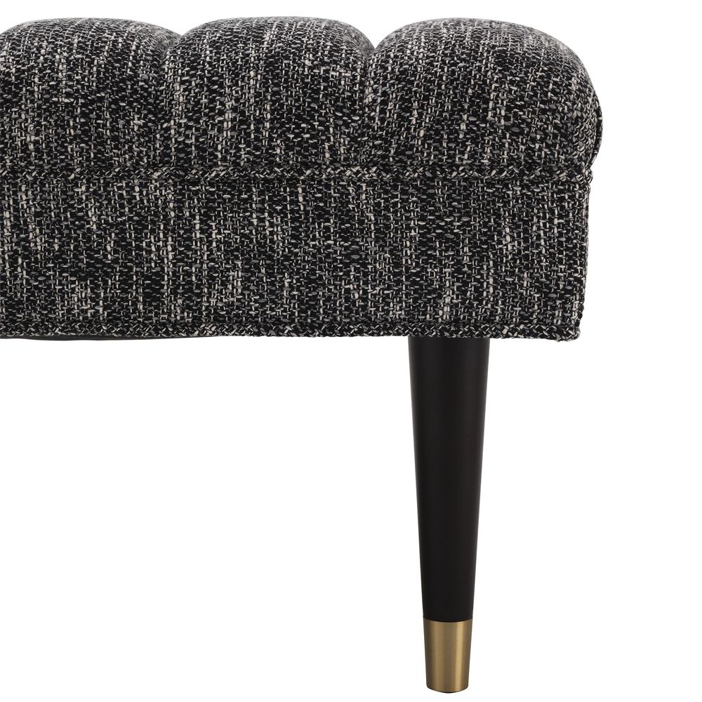 A large contemporary cannon black ottoman bench by Eichholtz 