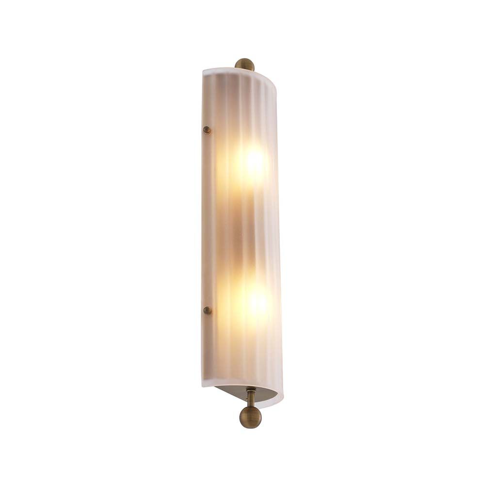 A delicate frosted glass wall lamp with antique brass details