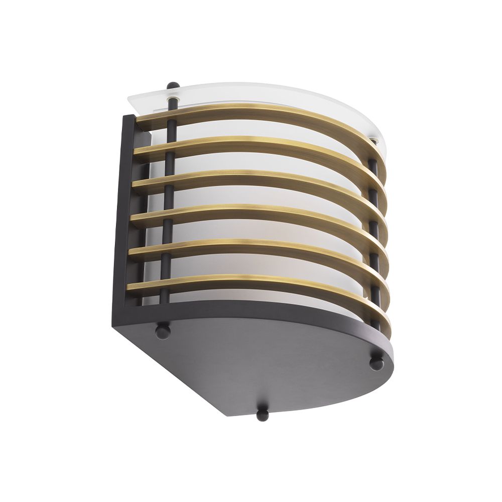 A sophisticated outdoor wall lamp by Eichholtz with a frosted glass shade and antique brass metal cage