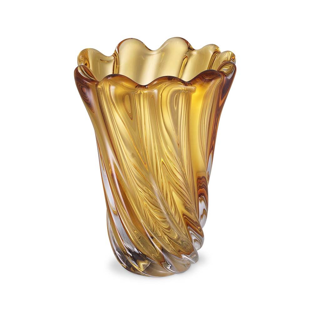 A handcrafted vase in yellow glass.