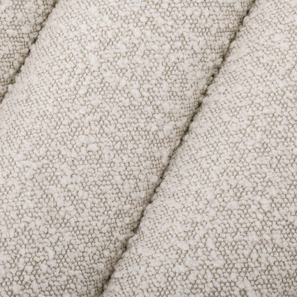 A boucle cream stool with deep channel stitching fit for any modern decor