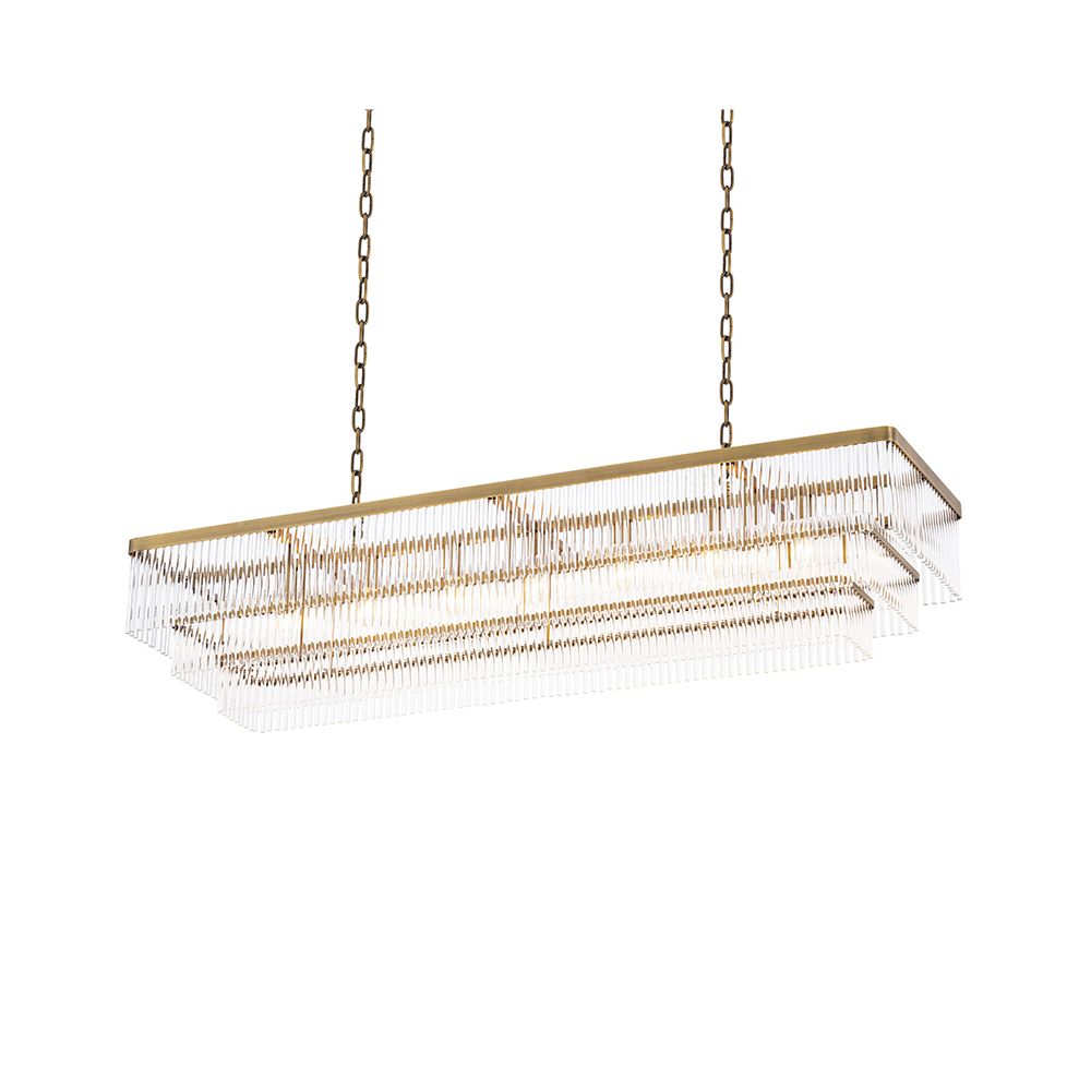 A captivating, Art Deco inspired chandelier by Eichholtz with three levels of clear glass rods and an antique brass finish