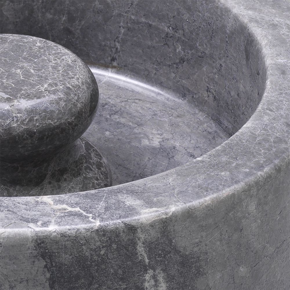 A luxurious grey marble ashtray by Eichholtz with a smooth and sophisticated charm