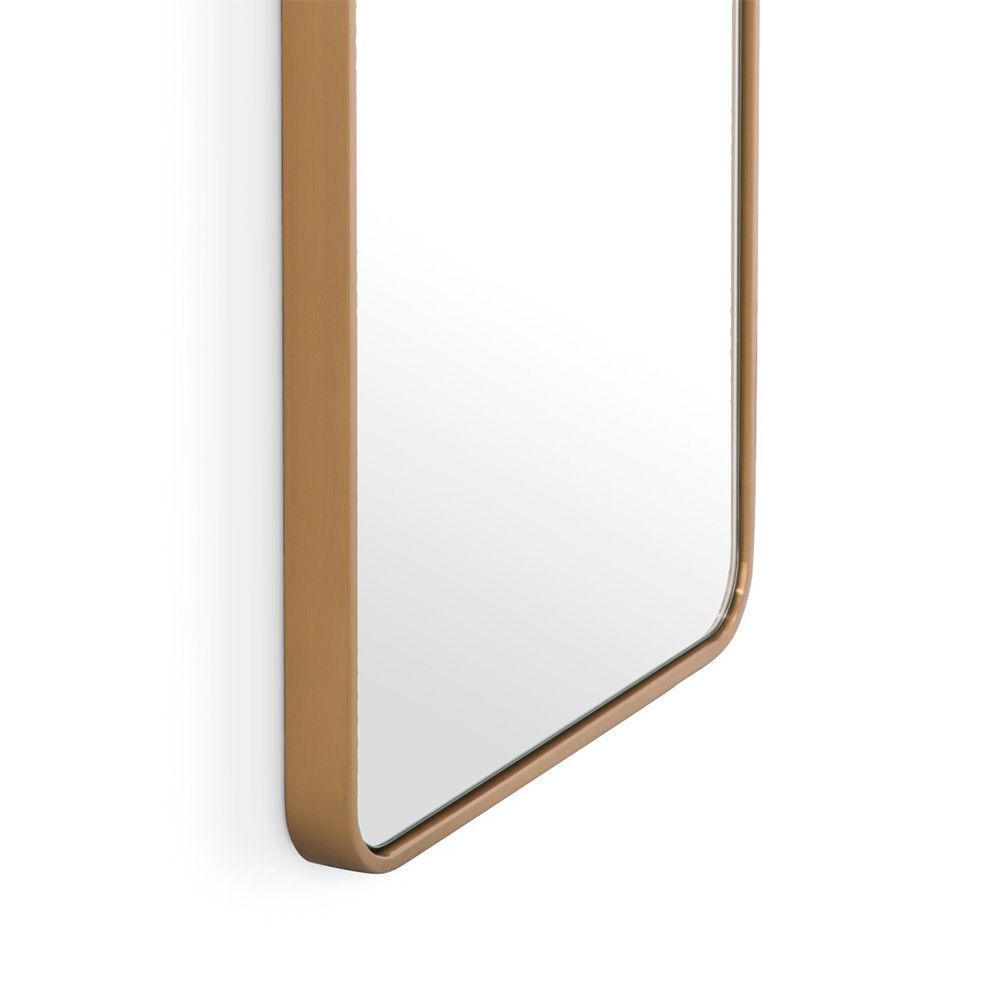 Rectangular mirror with glamourous rounded edges and a brass finish frame