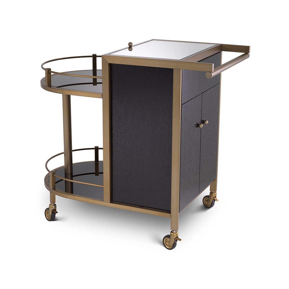 A contemporary drinks trolley by Eichholtz with a glamourous brushed brass finish 