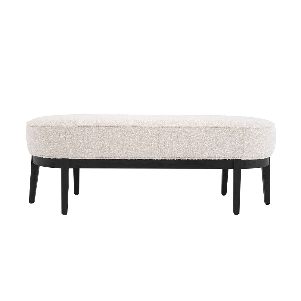 An elegant bench by Eichholtz with a luxury bouclé cream upholstery and beautiful black finished frame