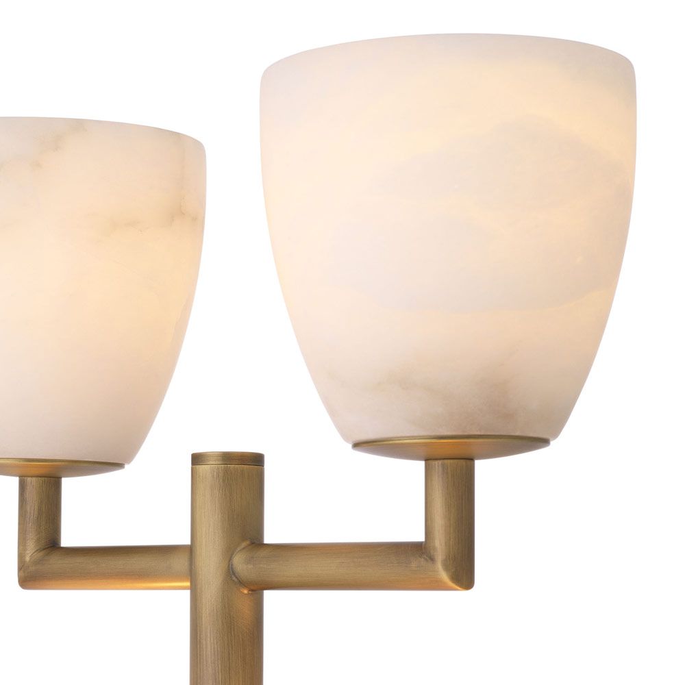 A luxurious, candelabra style side lamp crafted from alabaster with an antique brass finish