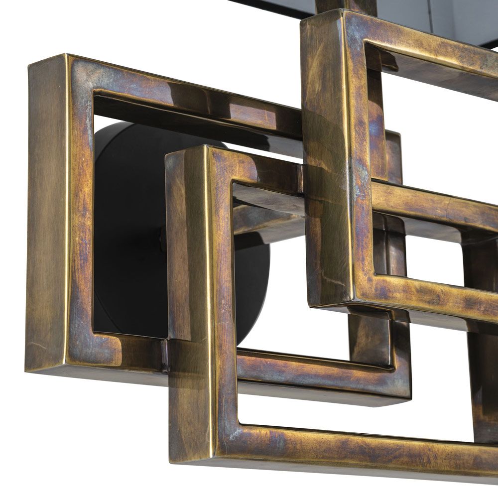 Art-deco inspired wall light with black shade and antique brass finish