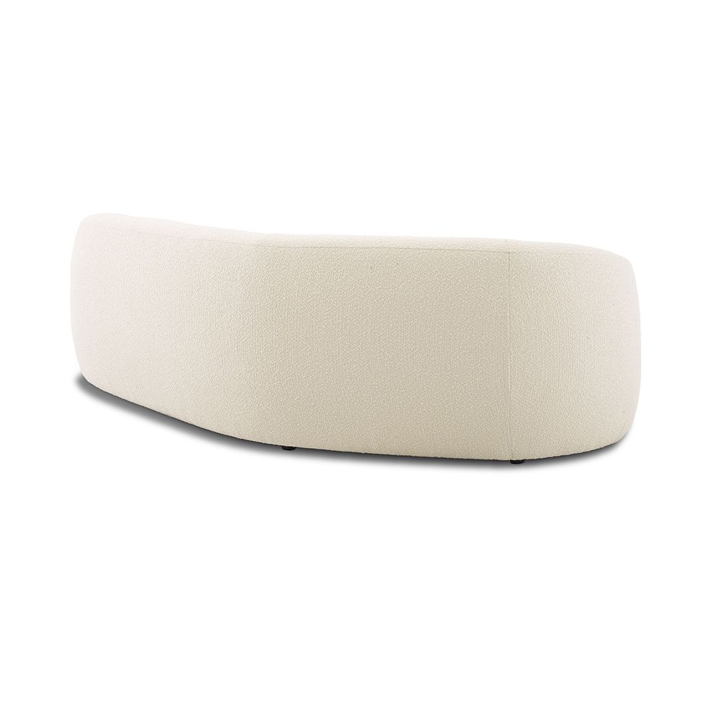 A chic and curvy sofa by Eichholtz with a luxury boucle upholstery