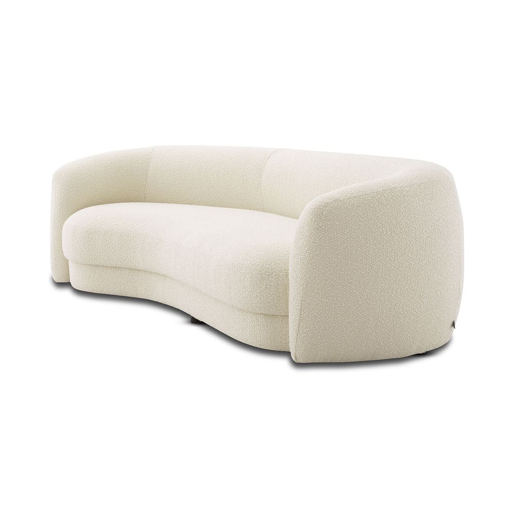A chic and curvy sofa by Eichholtz with a luxury boucle upholstery