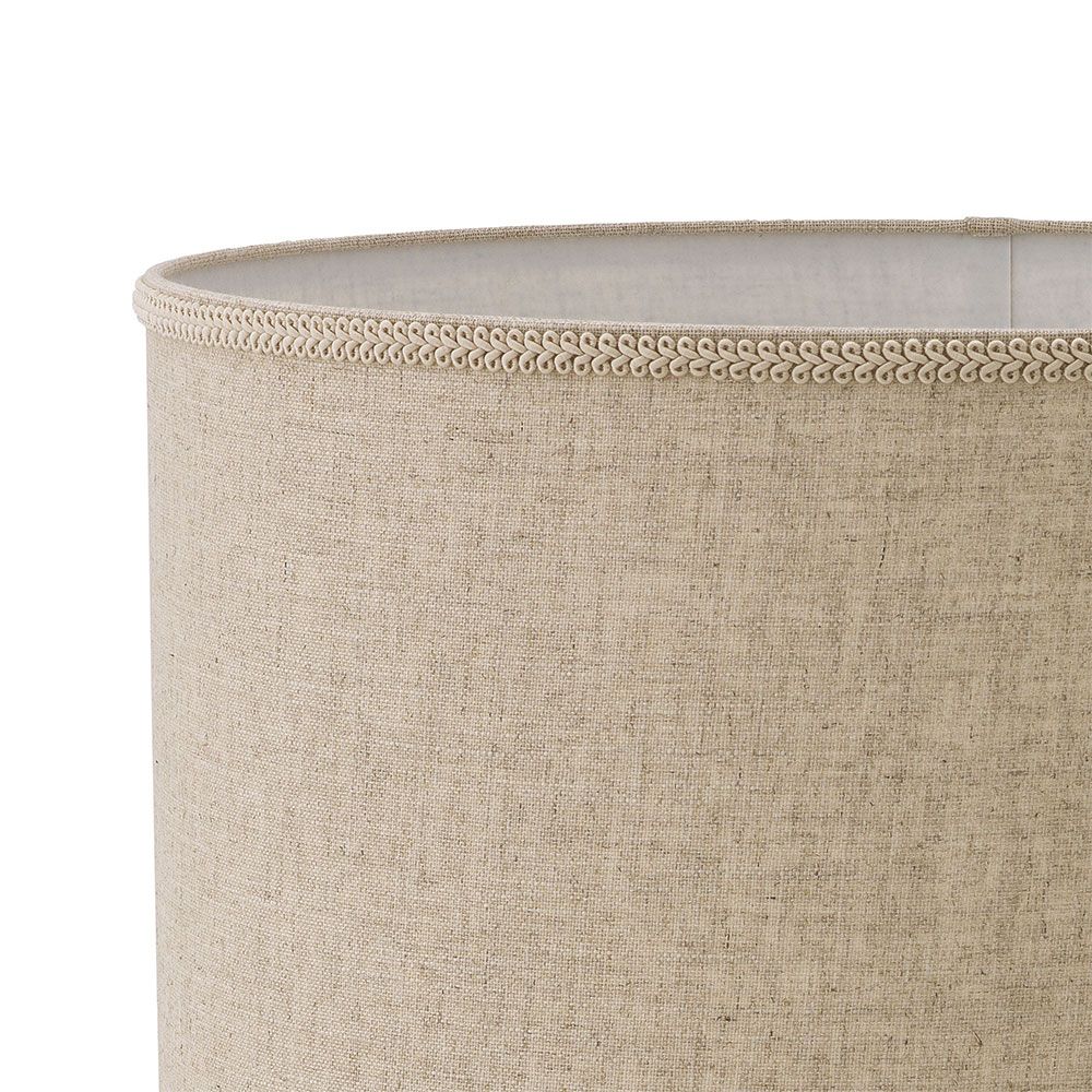 Beautiful table lamp with sweeping curves and natural linen shade with subtle embroidery