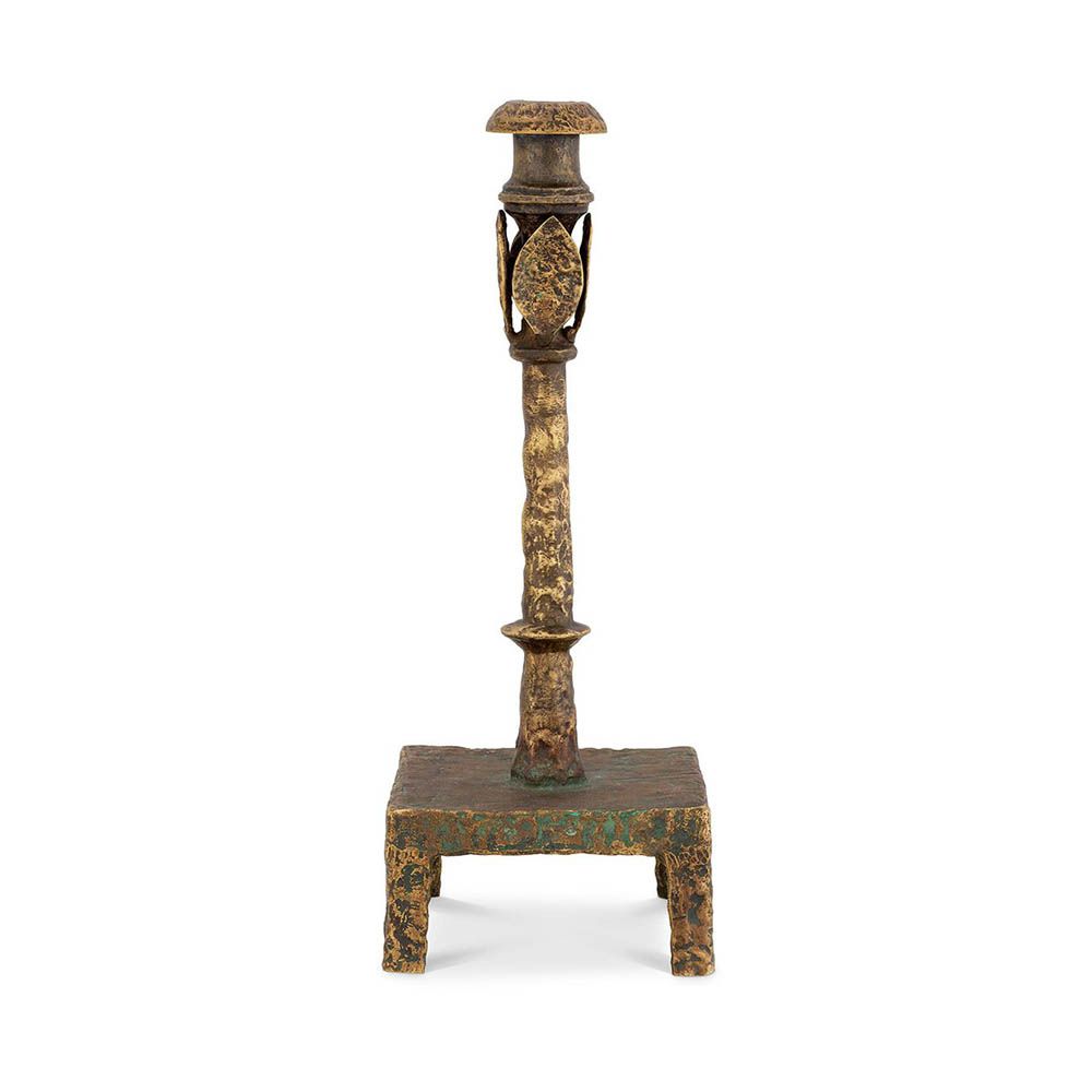 elegant antique-inspired brass candle holder