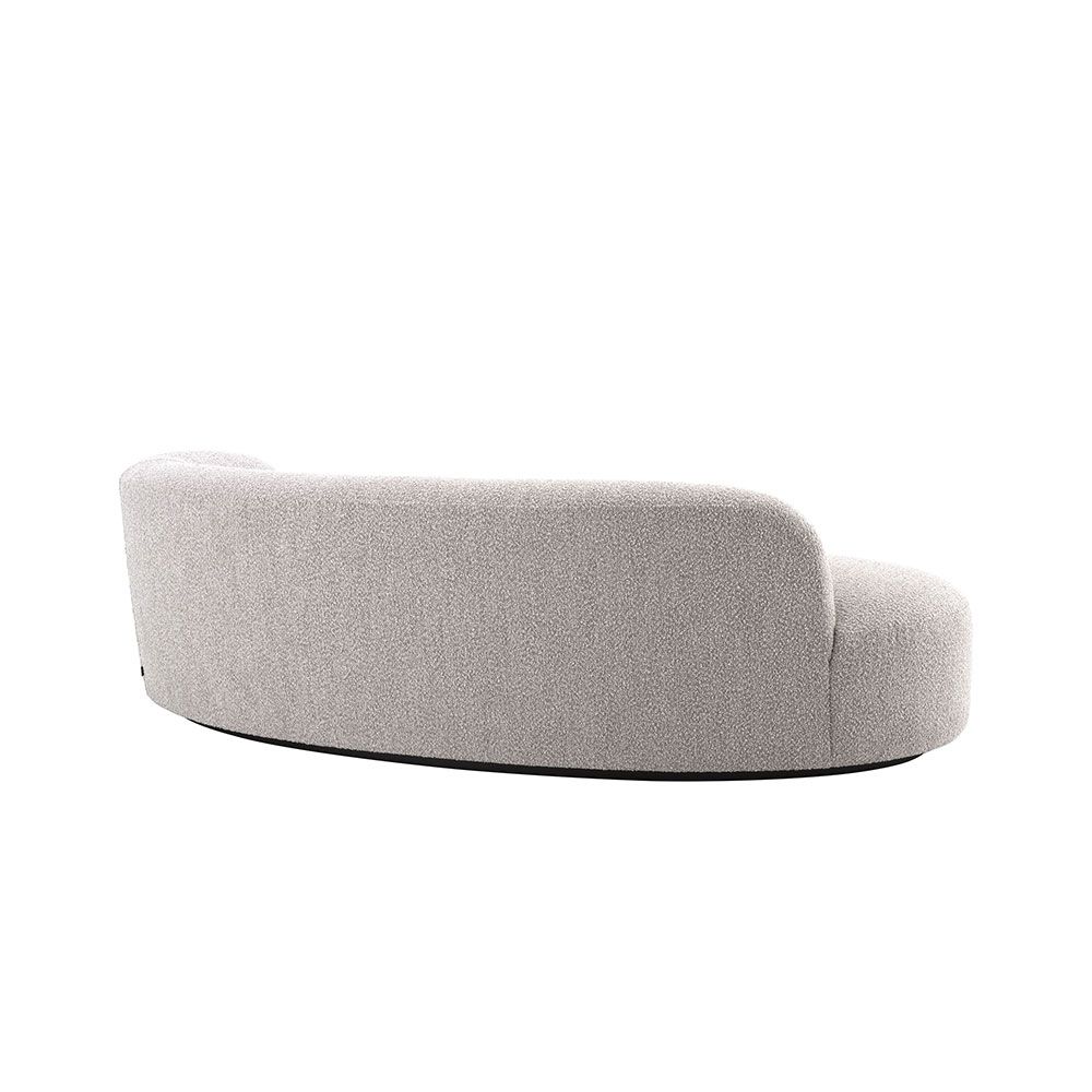 A luxuriously sumptuous grey boucle sofa 
