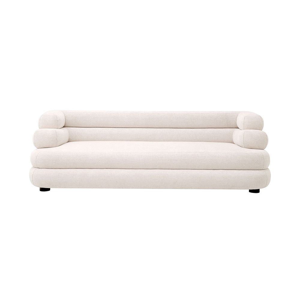 A contemporary and curvaceous sofa by Eichholtz with a luxury Lyssa Off-White upholstery