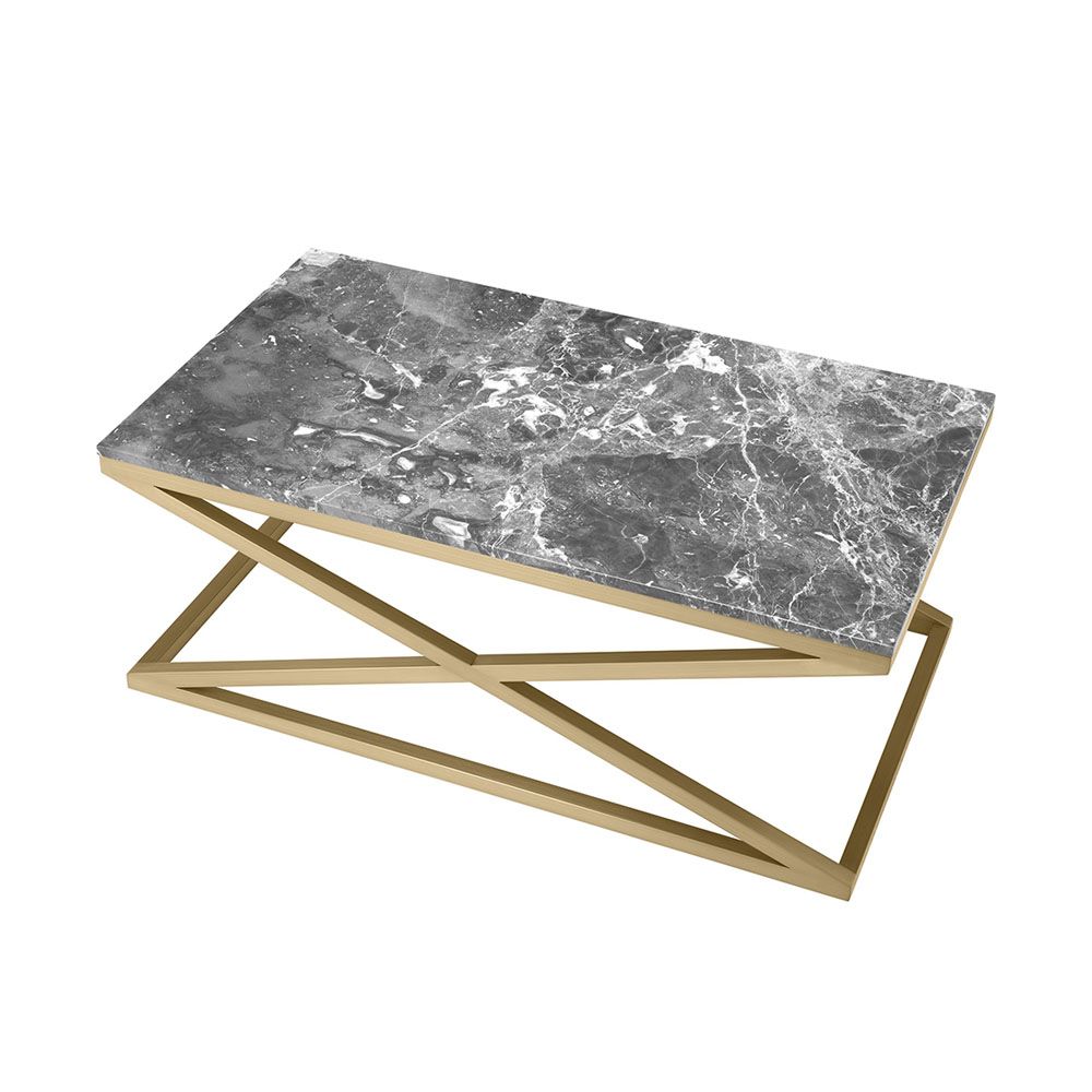 A stylish coffee table with cross-details and a grey marble surface 