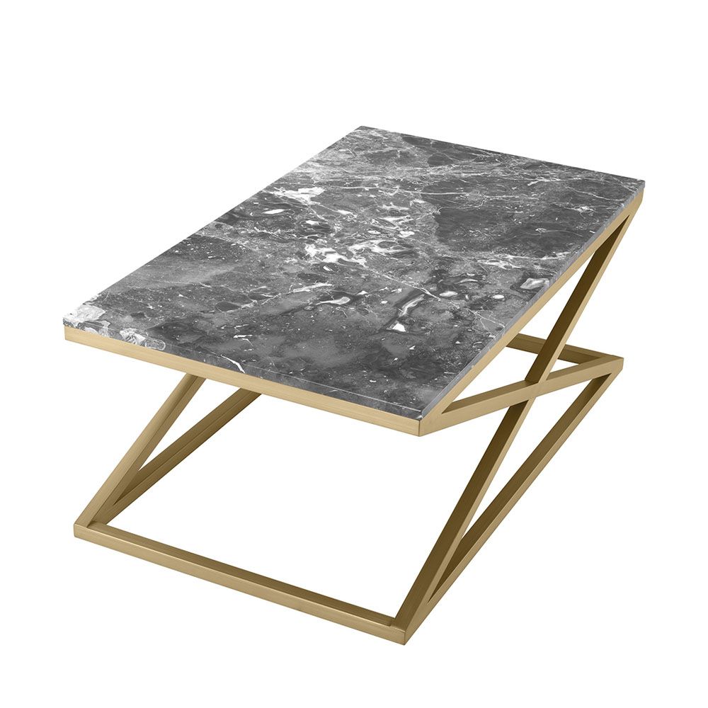 A stylish coffee table with cross-details and a grey marble surface 