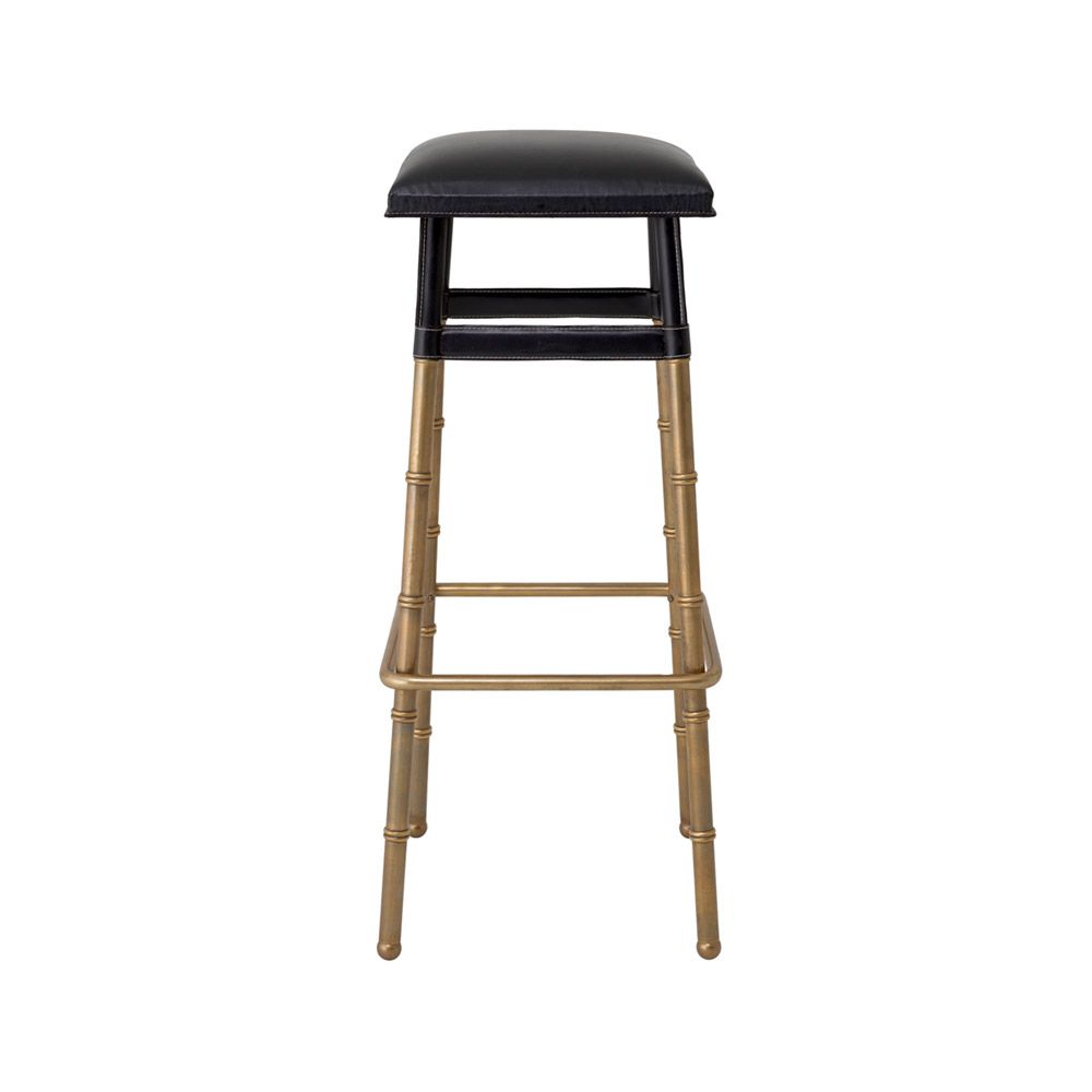 A stylish bar stool by Eichholtz with a black leather and vintage brass finish