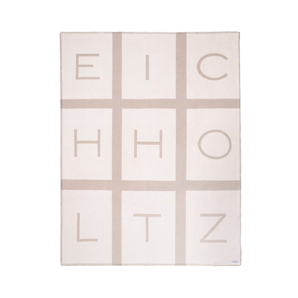 Greige and cream cashmere and wool throw with Eichholtz branding