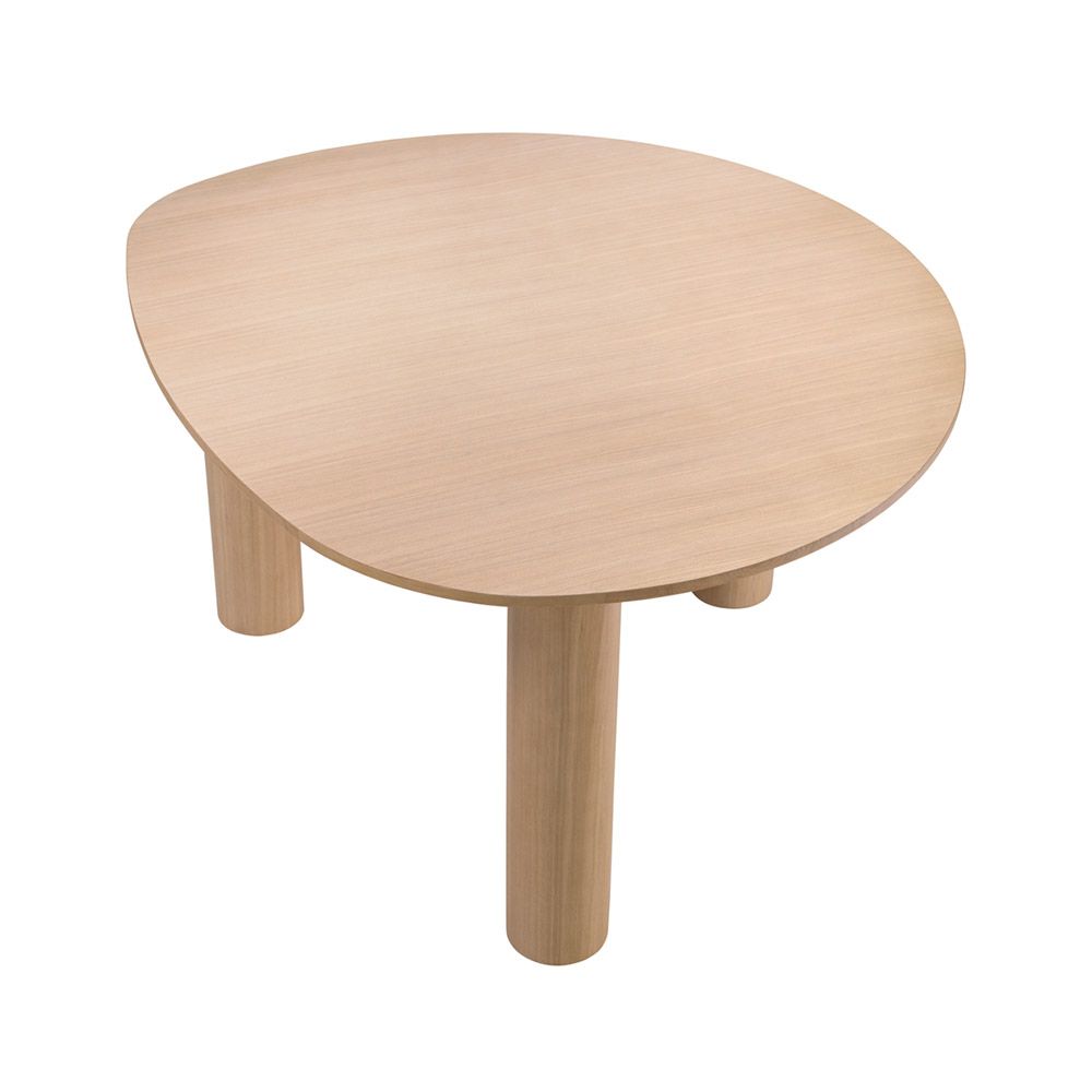 A rounded dining table by Eichholtz with a natural finish