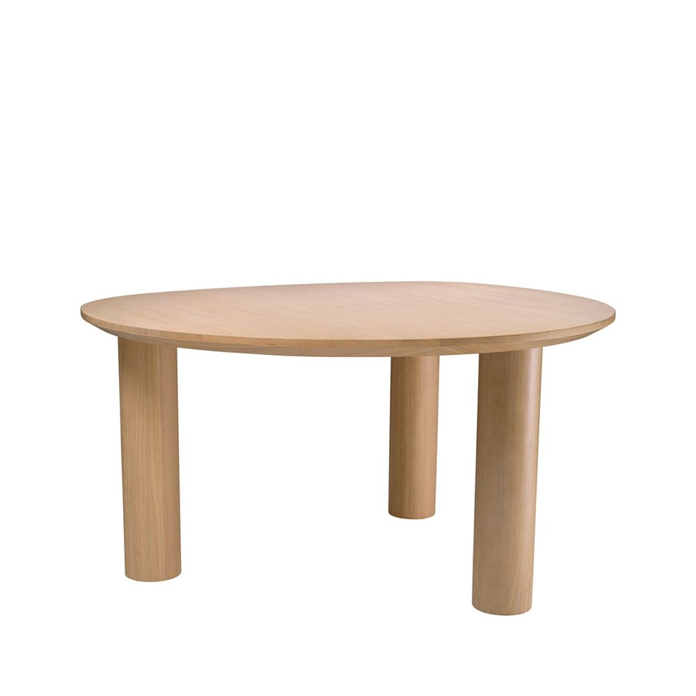 A rounded dining table by Eichholtz with a natural finish