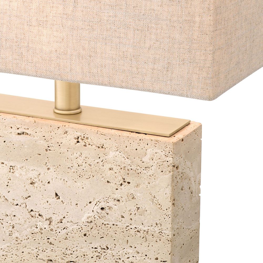 Striking, modern travertine table lamp with brass accents