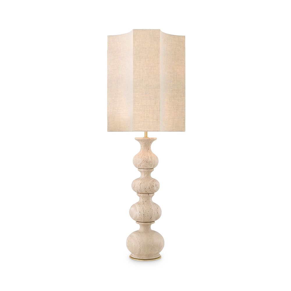 A sophisticated travertine table lamp by Eichholtz with a bulbous base and unique shaped shade