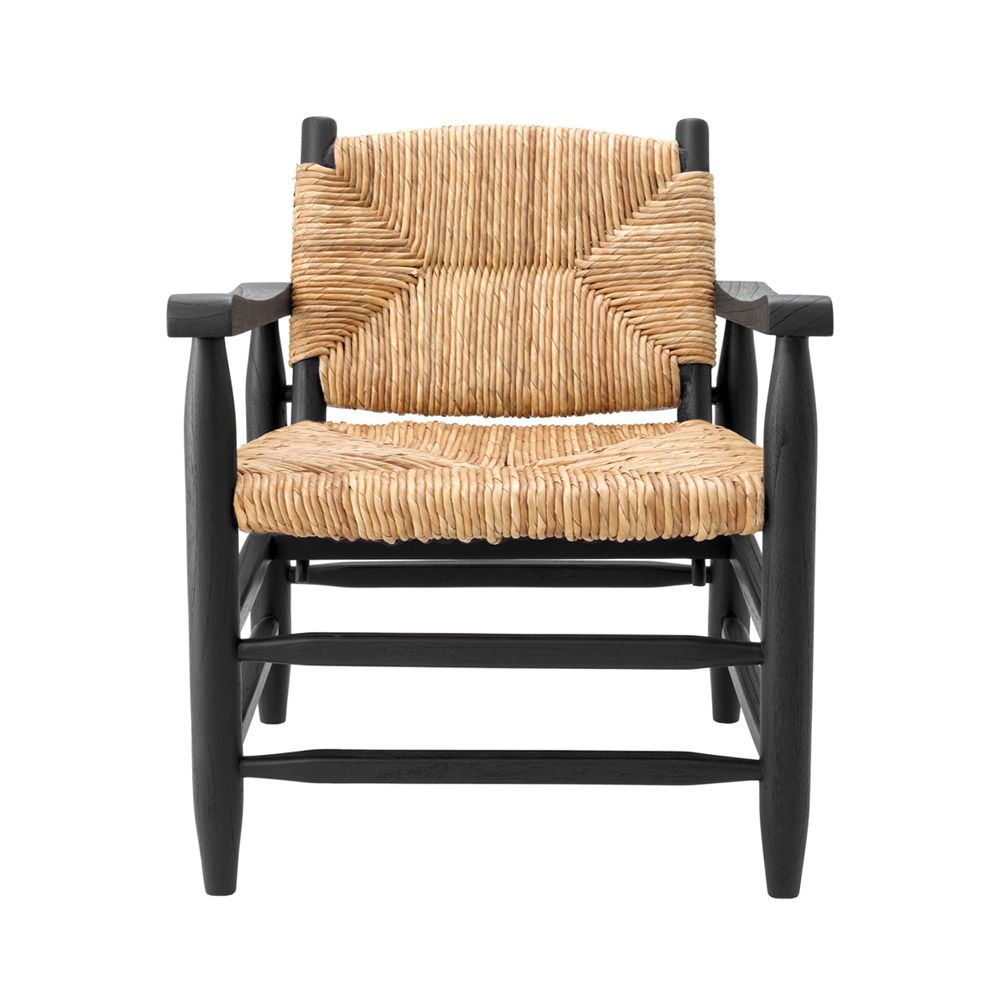 Bold black frame armchair with rustic woven backrest and seat