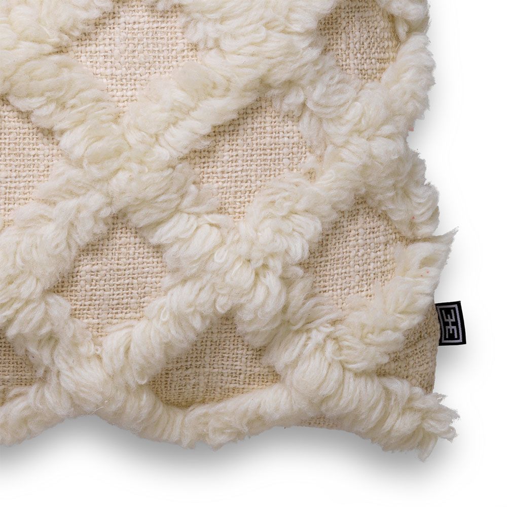Fluffy grid pattern cushion in timeless cream colour