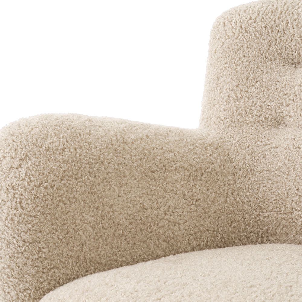 Cosy canberra sand upholstered sofa with sumptuous curves and deep stitching details