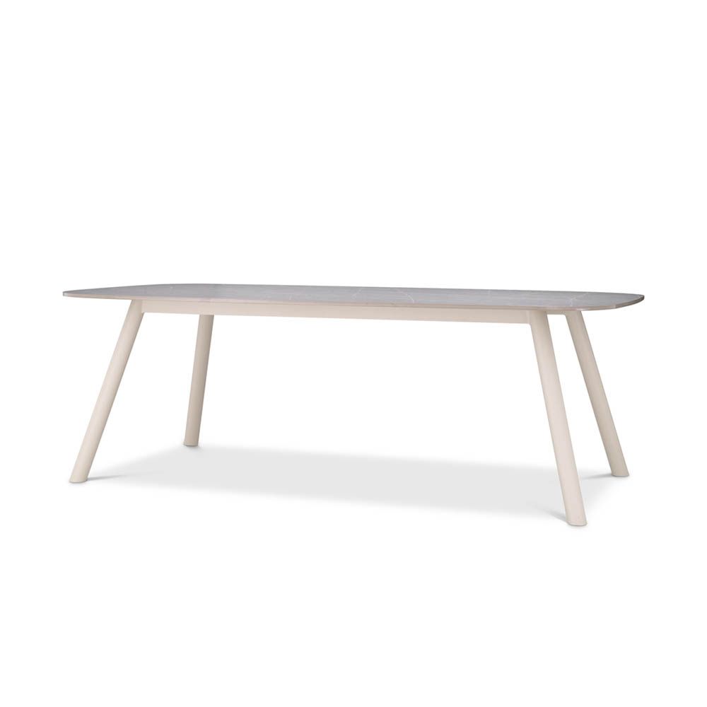 Grey stone top dining table with tapered white legs