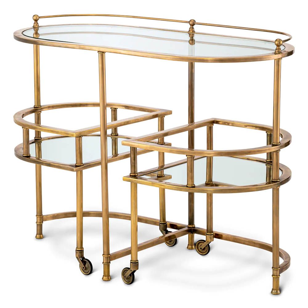 Vintage brass trolley paired with elegant mirrored glass top and clear glass layer